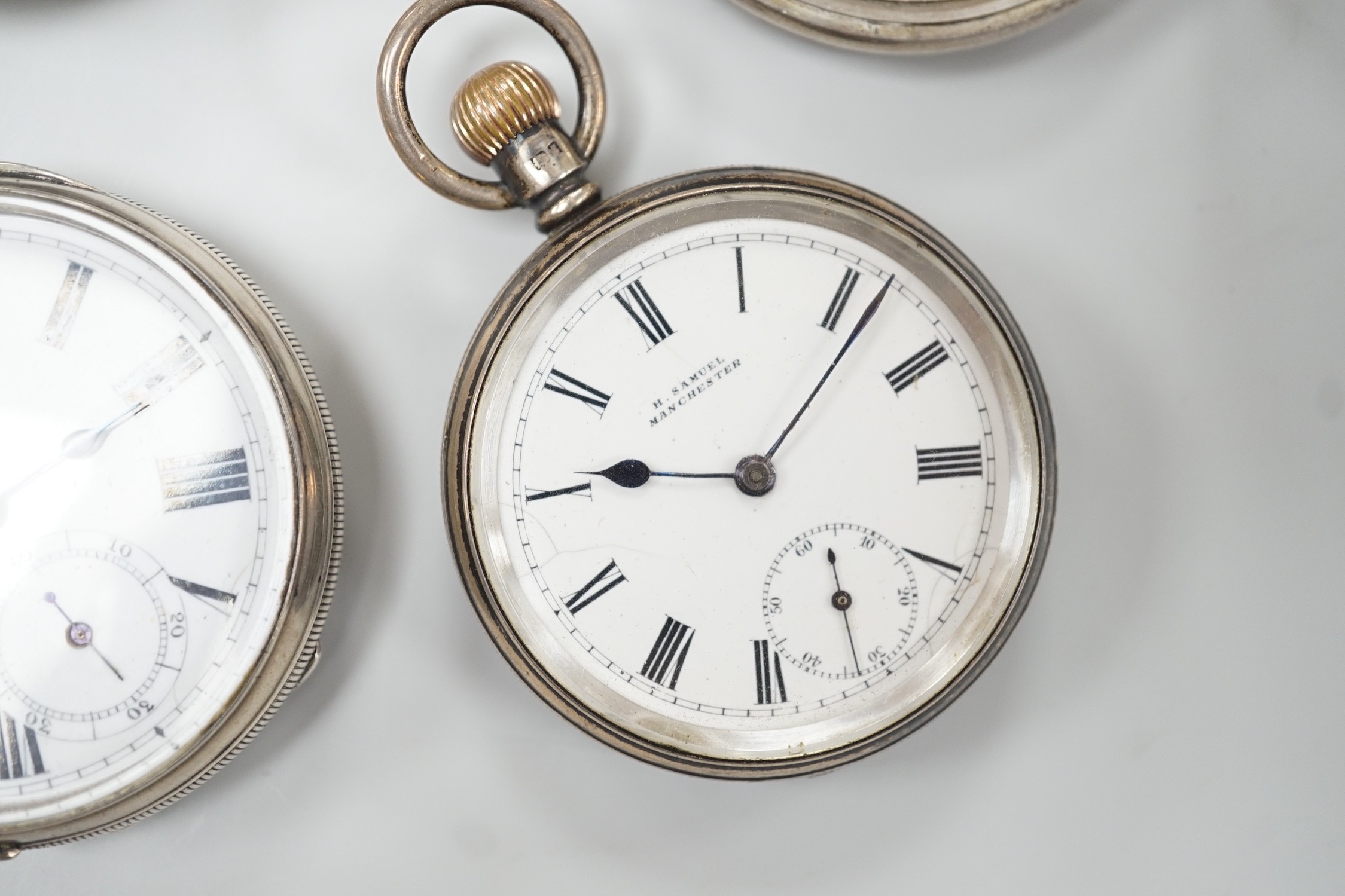 Three assorted Victorian and later silver open face pocket watches, including keywind and keyless and a silver hunter pocket watch.